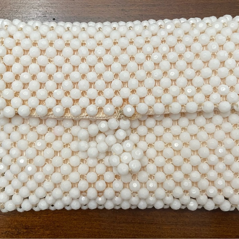 Vintage white beaded, nude/tan lined clutch. So cute!